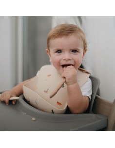 Bavoir souple en silicone Mushie Dinosaures 2