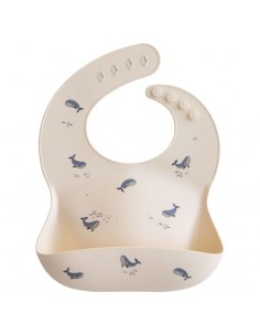 Bavoir souple en silicone Mushie Baleines bleues