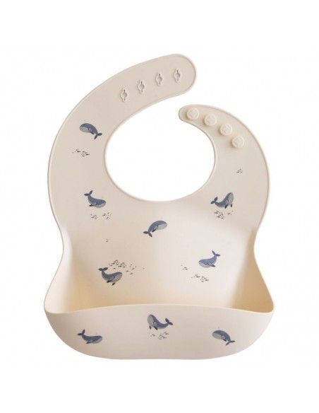 Bavoir souple en silicone Mushie Baleines bleues