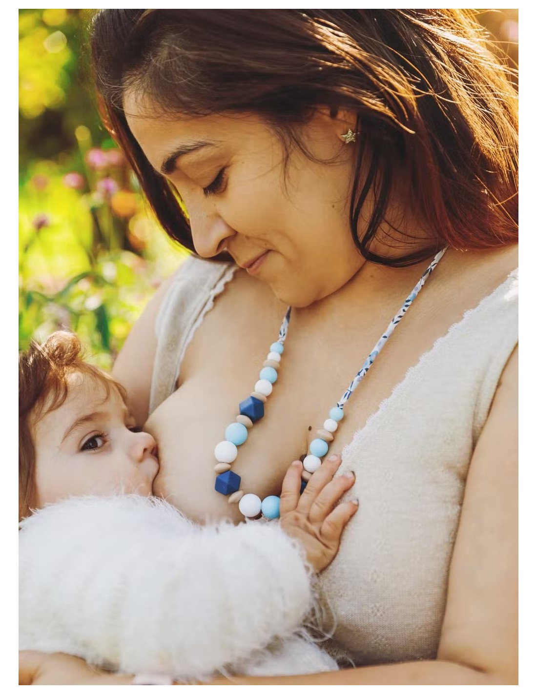 Collier d'allaitement Bleu avec anneaux sur nat-essence