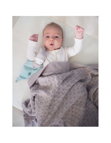 Couverture Ajour tricotée en coton biologique...