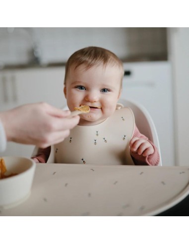 Bavoir souple en silicone Mushie Abeilles